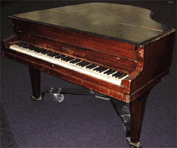 Antique Grand Piano.